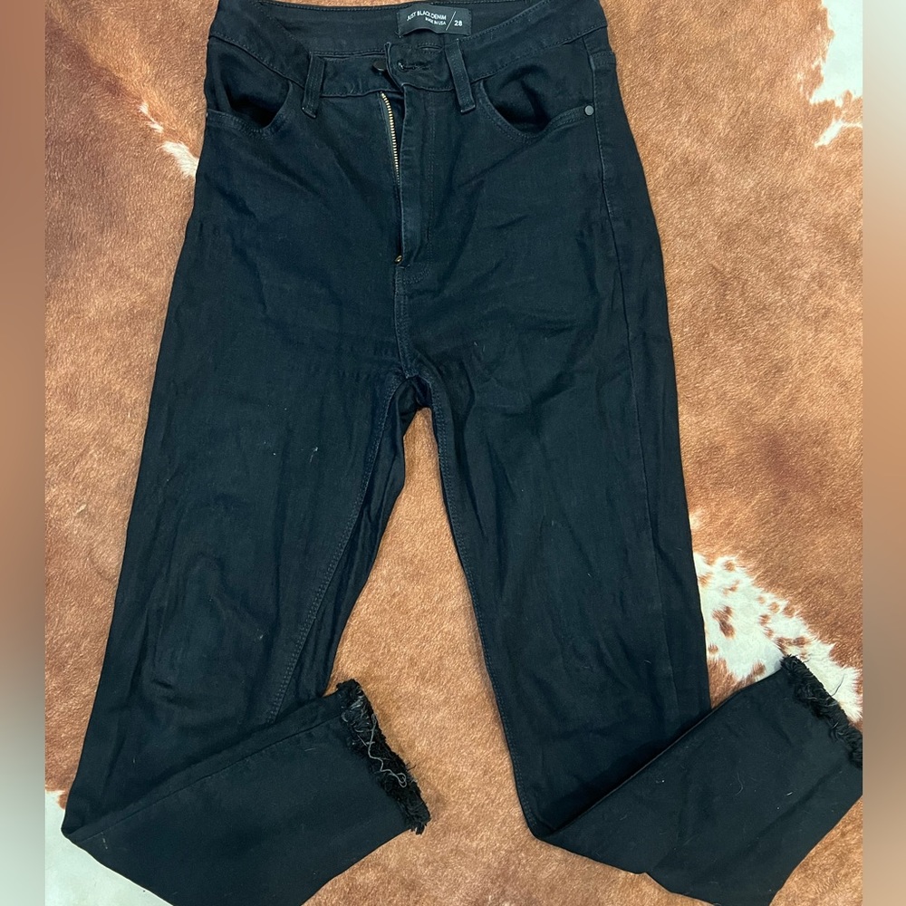 Black “just black” jeans with raw hem